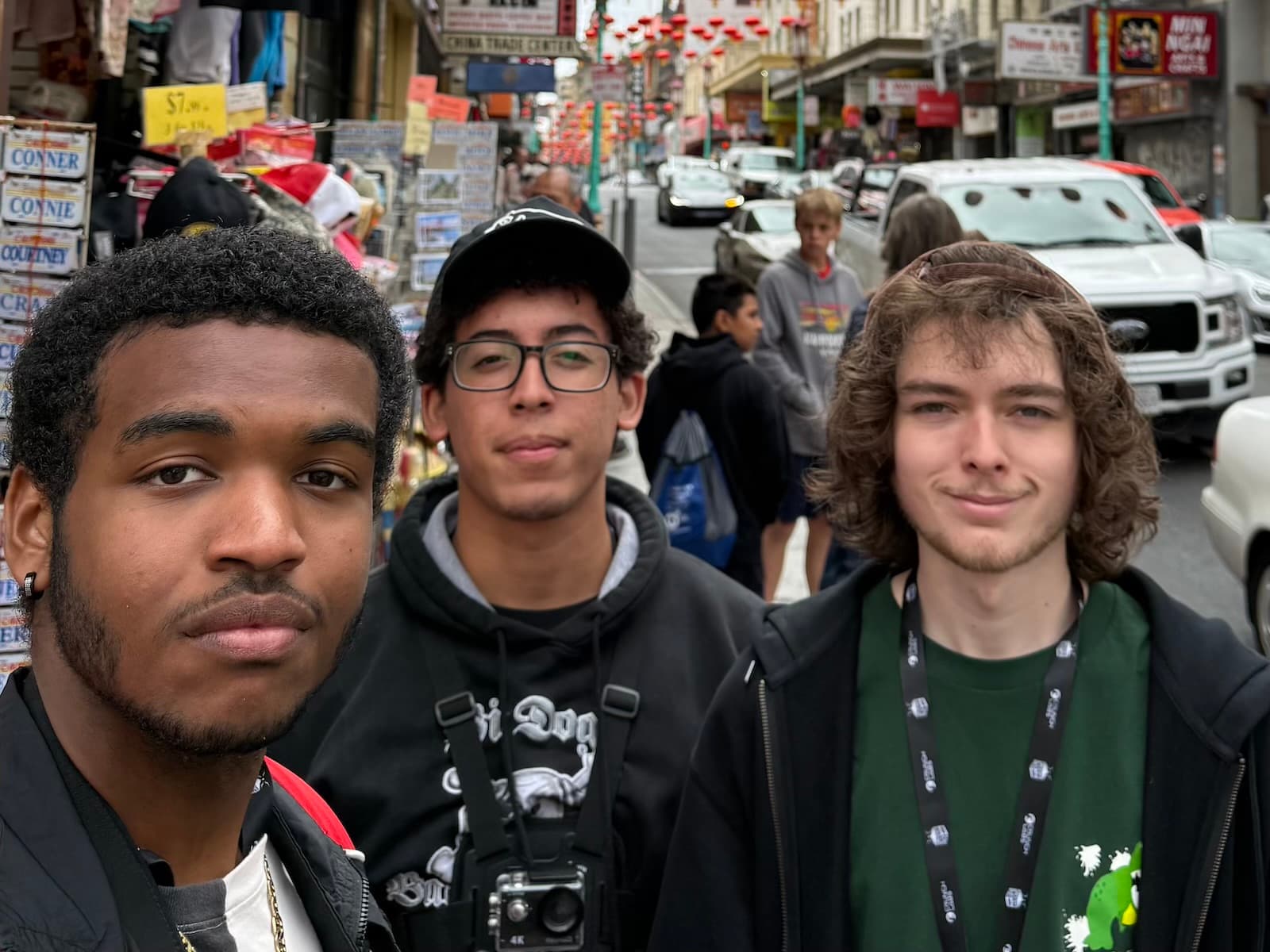Three members of the student team behind UVULITES, out on a city street